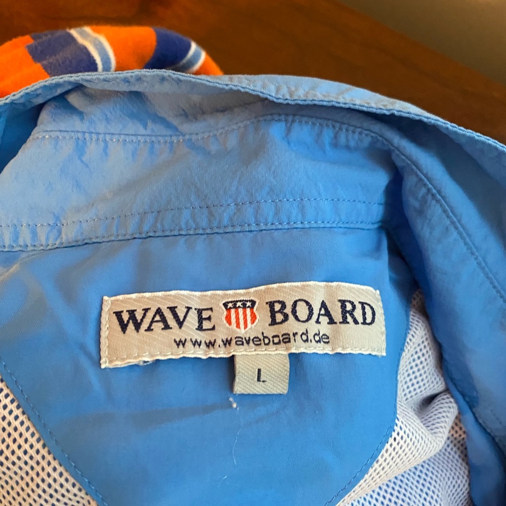 I’m selling a blue button down shirt that has built in mesh.